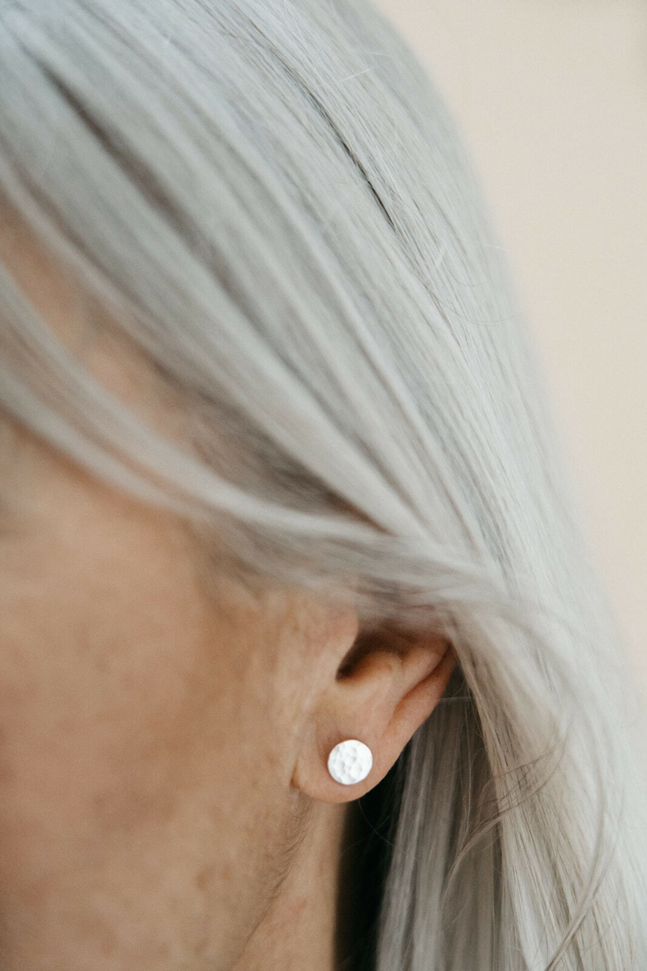 Button moment earrings hammered finishing
