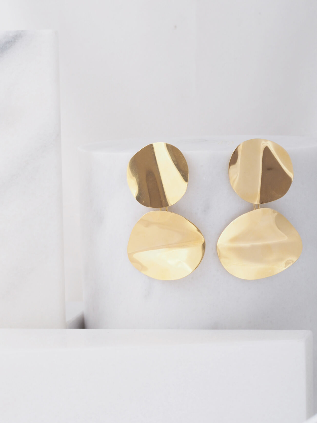 Double liquid earrings geel 1