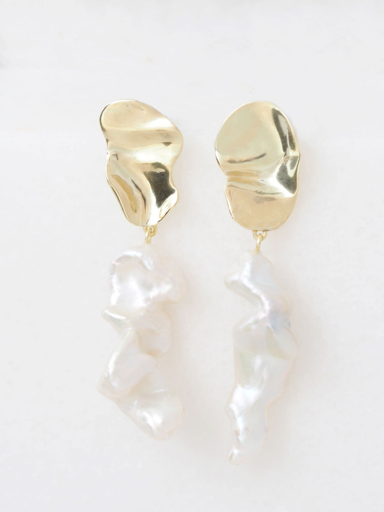 Liquid pearl earrings 1